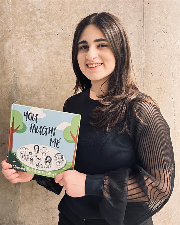 Talina Papazian is smiling as she poses for a photo.